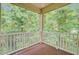 Enjoy the outdoors on this covered balcony, perfect for relaxing while overlooking the lush greenery at 1184 Dingle Rd, Mount Pleasant, SC 29466
