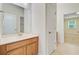 Bathroom featuring a vanity with storage and views into the bedroom at 1184 Dingle Rd, Mount Pleasant, SC 29466