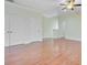 Bedroom featuring hardwood floors, ceiling fan, and two large closets, offering plenty of storage at 1184 Dingle Rd, Mount Pleasant, SC 29466