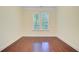 Cozy bedroom with hardwood floors, neutral walls, and a bright window with natural light at 1184 Dingle Rd, Mount Pleasant, SC 29466