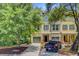 Inviting townhome exterior with a private garage and well-maintained front yard at 1184 Dingle Rd, Mount Pleasant, SC 29466