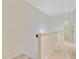 Spacious upstairs hallway features neutral walls and carpet and access to additional rooms at 1184 Dingle Rd, Mount Pleasant, SC 29466