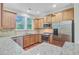 Kitchen features stainless steel appliances, granite countertops and wood cabinets, offering a sleek design at 1184 Dingle Rd, Mount Pleasant, SC 29466