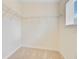 Functional walk-in closet with adjustable metal shelving and a window at 1184 Dingle Rd, Mount Pleasant, SC 29466