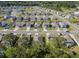 A wide aerial shot of a quiet suburban neighborhood with well-maintained homes and streets at 123 Lagoona Dr, Summerville, SC 29483