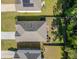An aerial view of the home with a fenced backyard, landscaping, and a well-manicured lawn at 123 Lagoona Dr, Summerville, SC 29483