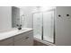 Modern bathroom featuring a single vanity, dark fixtures, and a glass enclosed shower at 123 Lagoona Dr, Summerville, SC 29483