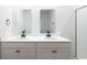 Modern bathroom with double sink vanity, dark fixtures, and glass-enclosed shower at 123 Lagoona Dr, Summerville, SC 29483