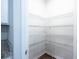 A walk-in pantry with wire shelving offers tons of storage space at 123 Lagoona Dr, Summerville, SC 29483