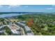 Aerial view of condo complex surrounded by marsh and greenery and pointing to unit at 125 Pier View St # 408, Charleston, SC 29492
