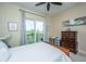 Cozy bedroom with a large window that leads out to a balcony with great view at 125 Pier View St # 408, Charleston, SC 29492