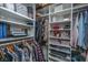 Well-organized walk-in closet with ample shelving and hanging space to easily organize clothes and personal items at 125 Pier View St # 408, Charleston, SC 29492