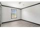 Serene bedroom offers modern flooring and a window providing natural light at 1326 Givhans Rd, Ridgeville, SC 29472
