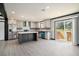 Modern kitchen featuring an island, stainless steel appliances, and plenty of cabinet space at 1326 Givhans Rd, Ridgeville, SC 29472