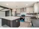 Spacious kitchen with an island, stainless steel appliances, and ample countertop space at 1326 Givhans Rd, Ridgeville, SC 29472
