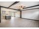 Open-concept living area showcasing hardwood floors and ceiling beams at 1326 Givhans Rd, Ridgeville, SC 29472