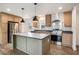 Modern kitchen with stainless steel appliances, wood cabinets, dark countertops and center island at 1332 Givhans Rd, Ridgeville, SC 29472