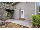 This home features a concrete patio with access to an outdoor wooden deck and backyard at 134 Hummingbird Ave, Ladson, SC 29456