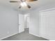 Comfortable bedroom with neutral walls, grey carpet, and closet with white bi-fold doors at 134 Hummingbird Ave, Ladson, SC 29456