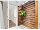 Unique courtyard with wooden accent wall, skylight, and white pebble ground cover at 134 Hummingbird Ave, Ladson, SC 29456