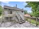 View of deck with wooden railing overlooking backyard at 134 Hummingbird Ave, Ladson, SC 29456