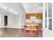 Open kitchen featuring wood cabinets and a table with bar stool seating at 134 Hummingbird Ave, Ladson, SC 29456