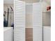 Bright laundry room features a storage closet, washer, dryer and utility shelving at 134 Hummingbird Ave, Ladson, SC 29456