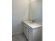 Bathroom featuring white cabinets, quartz countertop, large mirror and marble floors at 124 Ireland Dr, Summerville, SC 29486