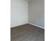 Neutral bedroom featuring hardwood floors and white and grey textured walls at 124 Ireland Dr, Summerville, SC 29486