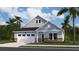 Charming single-Gathering home with a two-car garage, blue siding, and stone accents at 124 Ireland Dr, Summerville, SC 29486