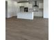 Open-concept kitchen with white cabinets and a center island at 124 Ireland Dr, Summerville, SC 29486