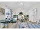 Bright bedroom with two beds, a ceiling fan, vaulted ceilings, and wood laminate flooring at 1682 Camfield Ln, Mount Pleasant, SC 29466