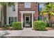Inviting front entrance with well-manicured bushes, brick accents, and elegant white pillar details at 1682 Camfield Ln, Mount Pleasant, SC 29466