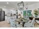 Bright kitchen and dining space with granite countertops, stainless appliances, and a backyard view at 1682 Camfield Ln, Mount Pleasant, SC 29466