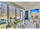 Bright and airy sunroom with plenty of natural light, comfortable seating, and a view of the outdoors at 1682 Camfield Ln, Mount Pleasant, SC 29466