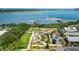 Stunning aerial view showcasing waterfront views, community park, and meticulously maintained landscaping at 1722 Trewin Ct, Charleston, SC 29492