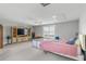 Spacious bedroom features neutral walls, carpeted floors, and a ceiling fan for added comfort at 1722 Trewin Ct, Charleston, SC 29492