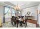 Elegant dining area with natural light, leading to a covered porch at 1722 Trewin Ct, Charleston, SC 29492