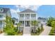 Charming two-story home with a welcoming front porch and manicured landscaping at 1722 Trewin Ct, Charleston, SC 29492
