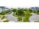 Scenic street view featuring meticulously maintained landscaping and charming single-Gathering homes at 1722 Trewin Ct, Charleston, SC 29492