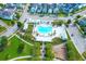 Aerial view of the community pool, playground, and green space in Summers Corner at 1888 Nola Run, Summerville, SC 29485