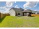 Backyard featuring an enclosed screened-in porch and a wood fence at 1888 Nola Run, Summerville, SC 29485