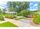 Inviting community playground and gathering spot with covered pergola, grassy areas, and bike rack for outdoor enjoyment at 1888 Nola Run, Summerville, SC 29485