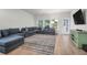 Spacious living room with comfortable seating, modern decor, and bright lighting, great for relaxing at 1888 Nola Run, Summerville, SC 29485