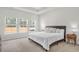 Bright and airy main bedroom features ample natural light and neutral decor at 1888 Nola Run, Summerville, SC 29485