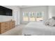 Cozy main bedroom with a large dresser, featuring a soft carpet and recessed lights at 1888 Nola Run, Summerville, SC 29485