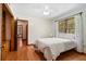 Bright bedroom with hardwood floors, large window, and natural light at 1900 Morgan Ave, North Charleston, SC 29406