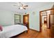 Bedroom featuring hardwood floors, dark wood trim, and natural light at 1900 Morgan Ave, North Charleston, SC 29406