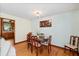 Cozy dining room featuring hardwood floors and a classic chandelier at 1900 Morgan Ave, North Charleston, SC 29406