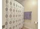 Bathroom showcasing a stylish shower curtain and neatly hung towels at 2150 Terrabrook Ln, Charleston, SC 29412